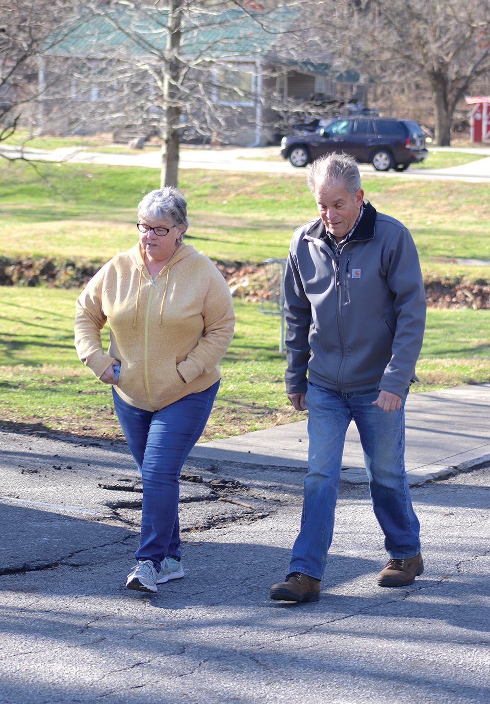 New Market's Ed Foerster pairs up with Crawfordsville resident Debbie Brown Tuesday afternoon near the Mill Street entrance to Milligan Park.